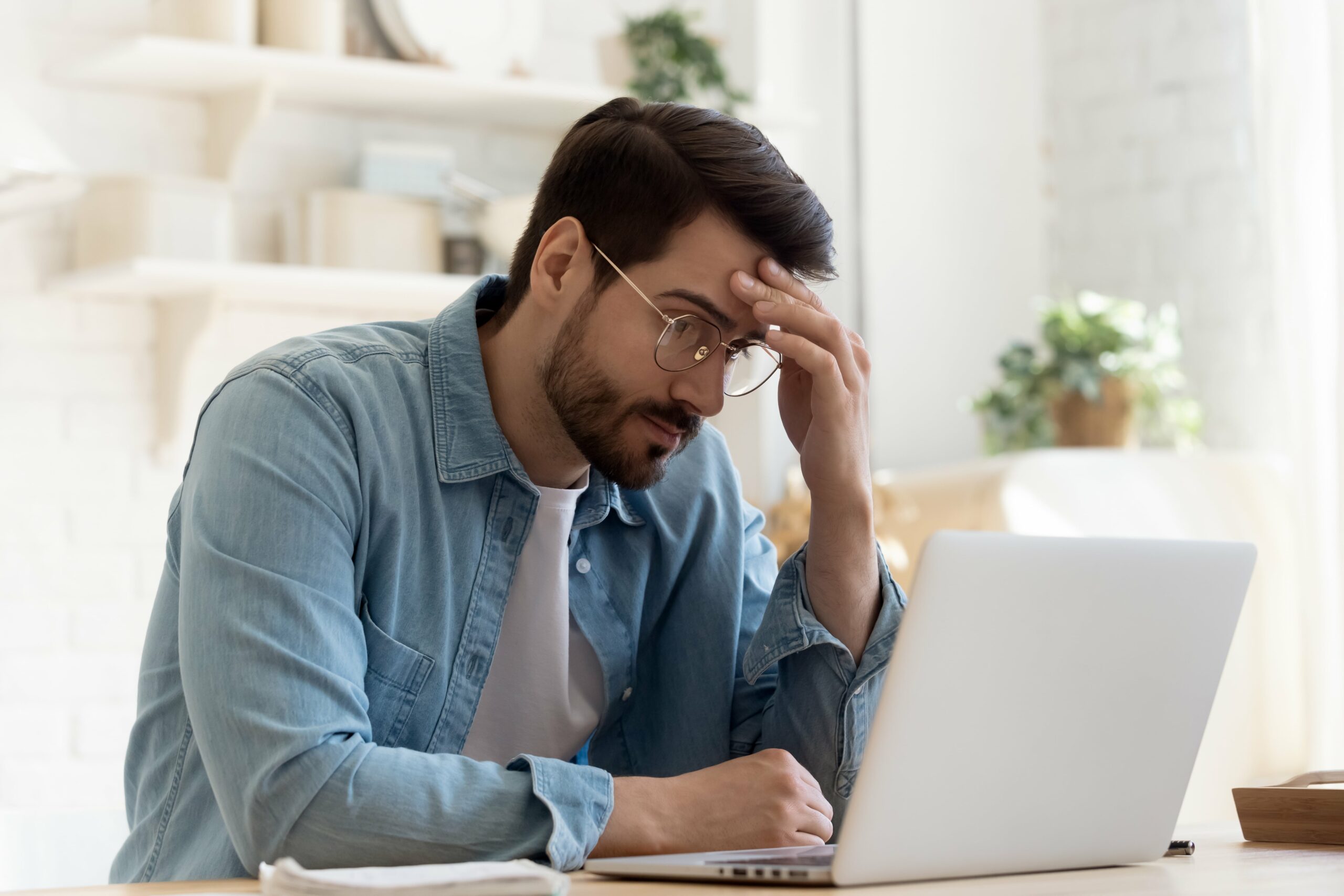 Man confused by computer screen feature image